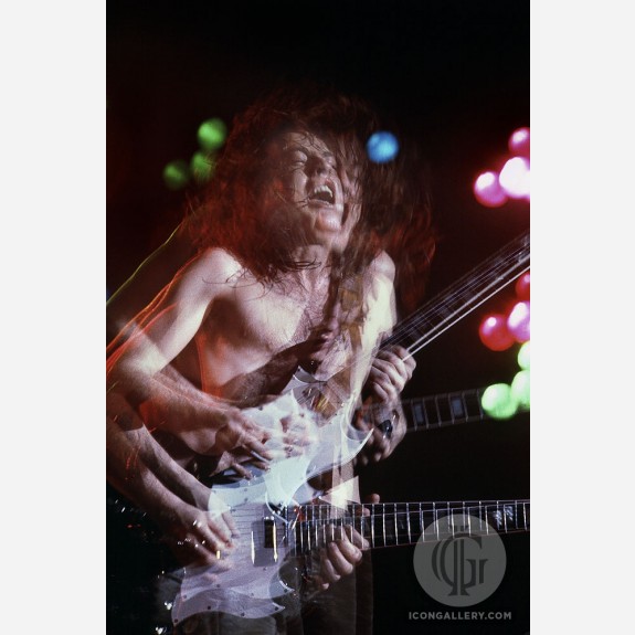 Angus Young of AC/DC by Al Rendon