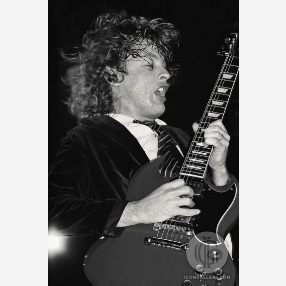 Angus Young of AC/DC by Ken Settle