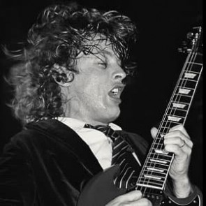 Angus Young of AC/DC by Ken Settle