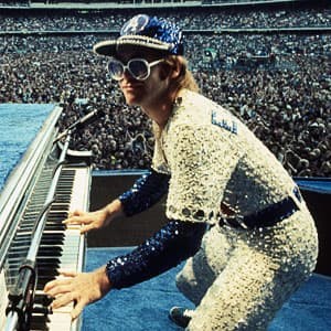 Elton John in Dodger uniform, 1975 — Limited Edition Print - Terry O'Neill